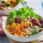 Quinoa-Bowl mit Kartoffelwürfeln aus der Heißluftfritteuse und Dressing